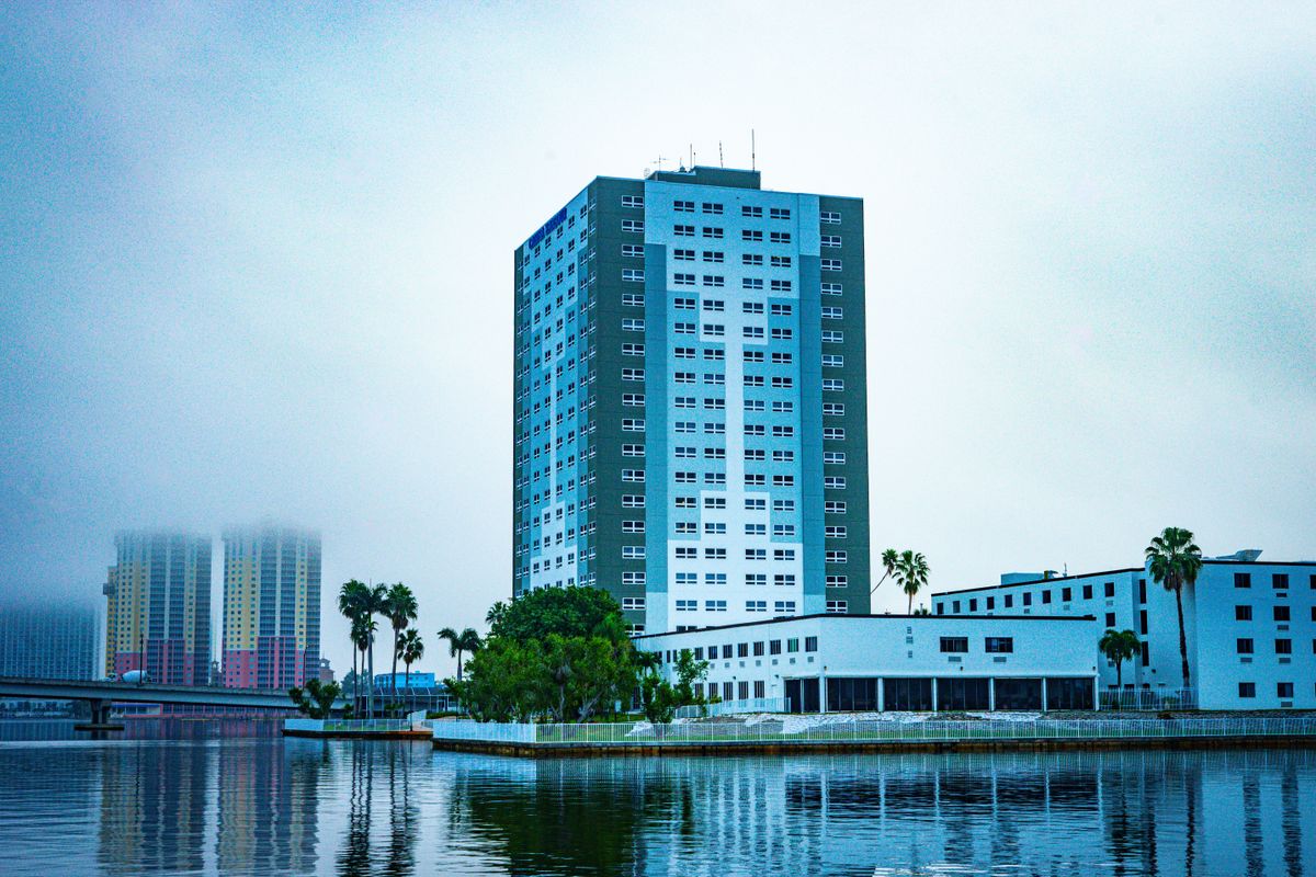 Tall building beside the river in Fort Myers, Florida