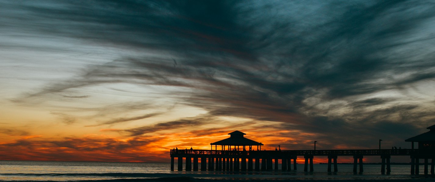 Sunset sky over a pier on the Gulf of Mexico