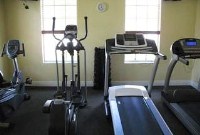 Forest Lake exercise room with treadmills and an elliptical trainer